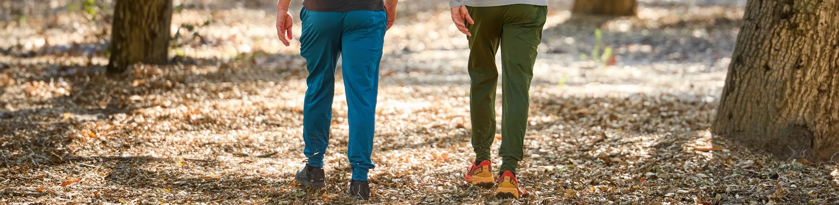 two men walking each wearing Nathan Sports Men's Joggers