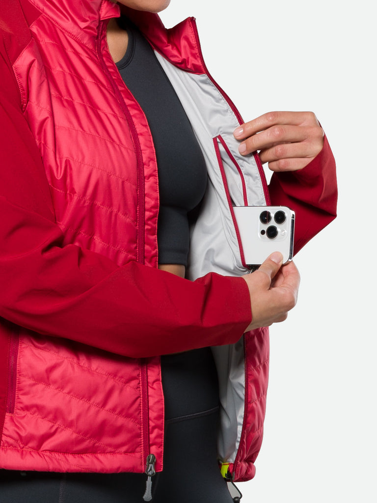 Nathan Women's Navigator Hybrid Jacket – Winterberry - On Model – Pulling Cell Phone From Interior Pocket