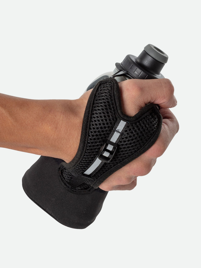 NATHAN QuickSqueeze Lite 12oz Insulated Handheld - Black/Marine Blue - Runner Gripping Handheld Through Strap