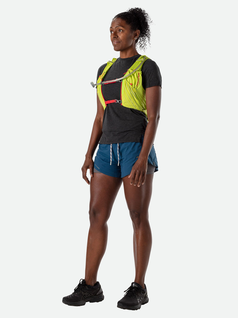 Nathan Pinnacle 12 Liter Women's Hydration Race Vest - Finish Lime/Hibiscus Red - Female Runner Side View
