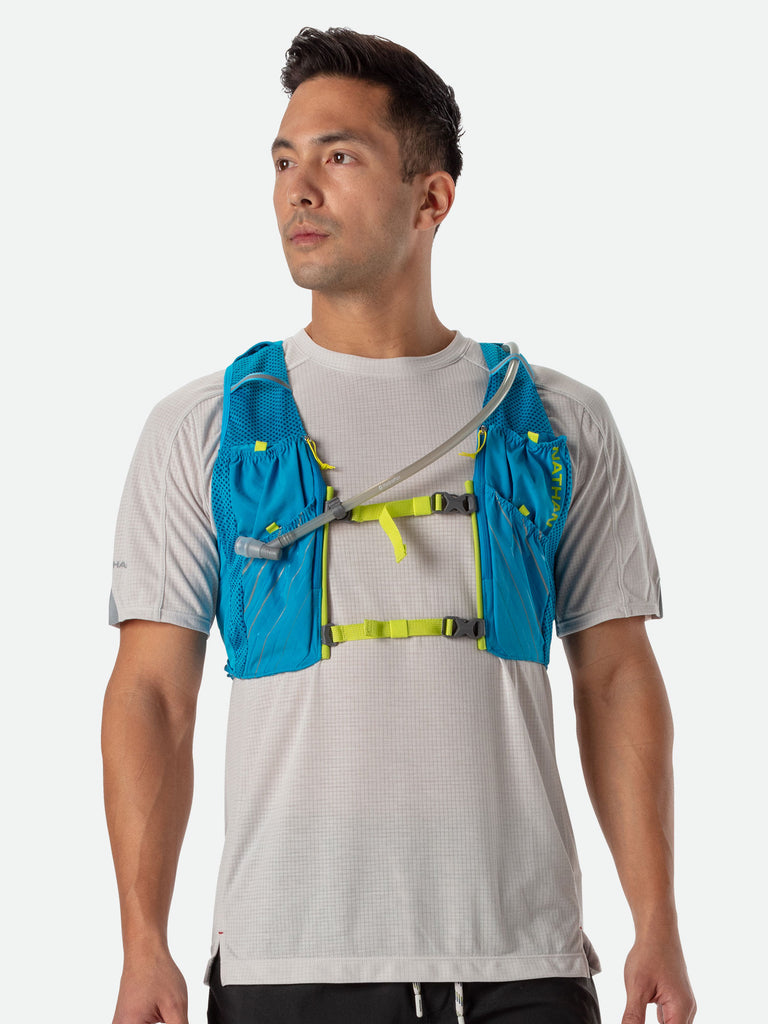 Nathan Pinnacle 12 Liter Unisex Hydration Race Vest - Blue Me Away/Finish Lime Green - Male Runner Front View