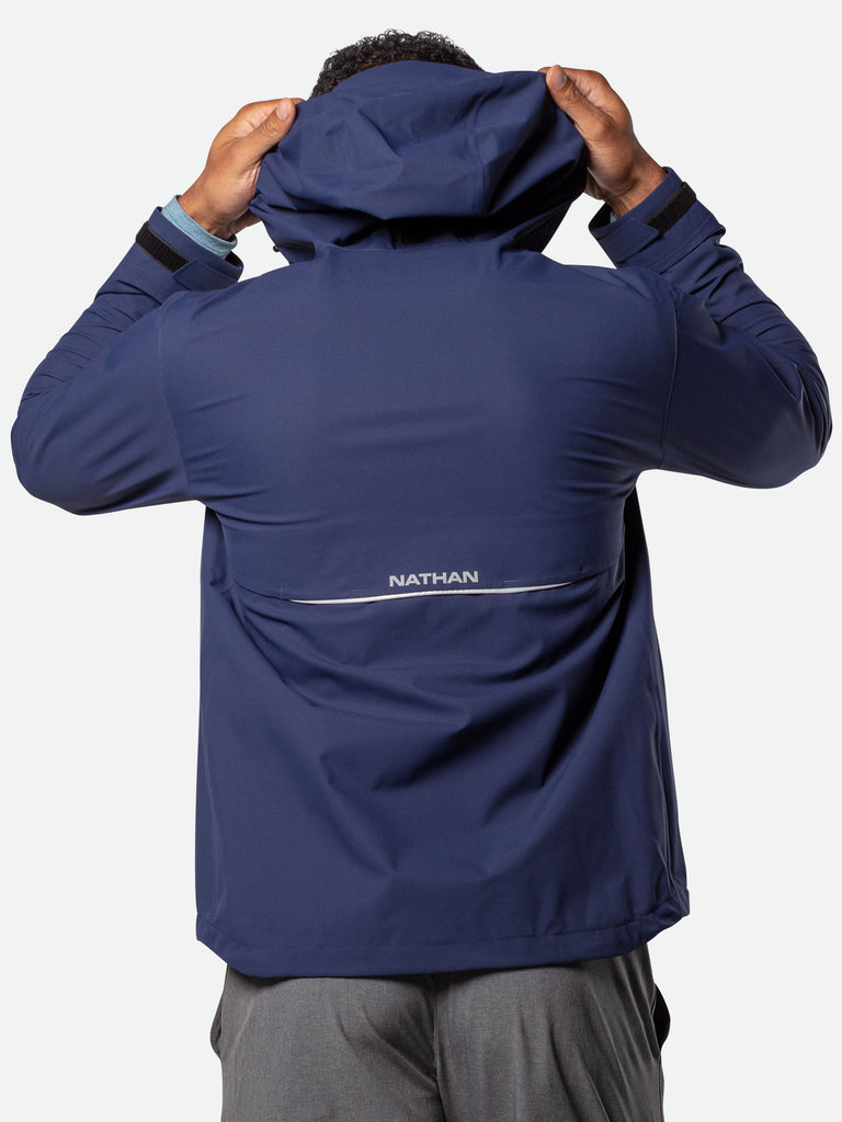 Nathan Men's Protector Rain Jacket – Peacoat Blue - On Model –  Pulling Adjustable Hood Over Head