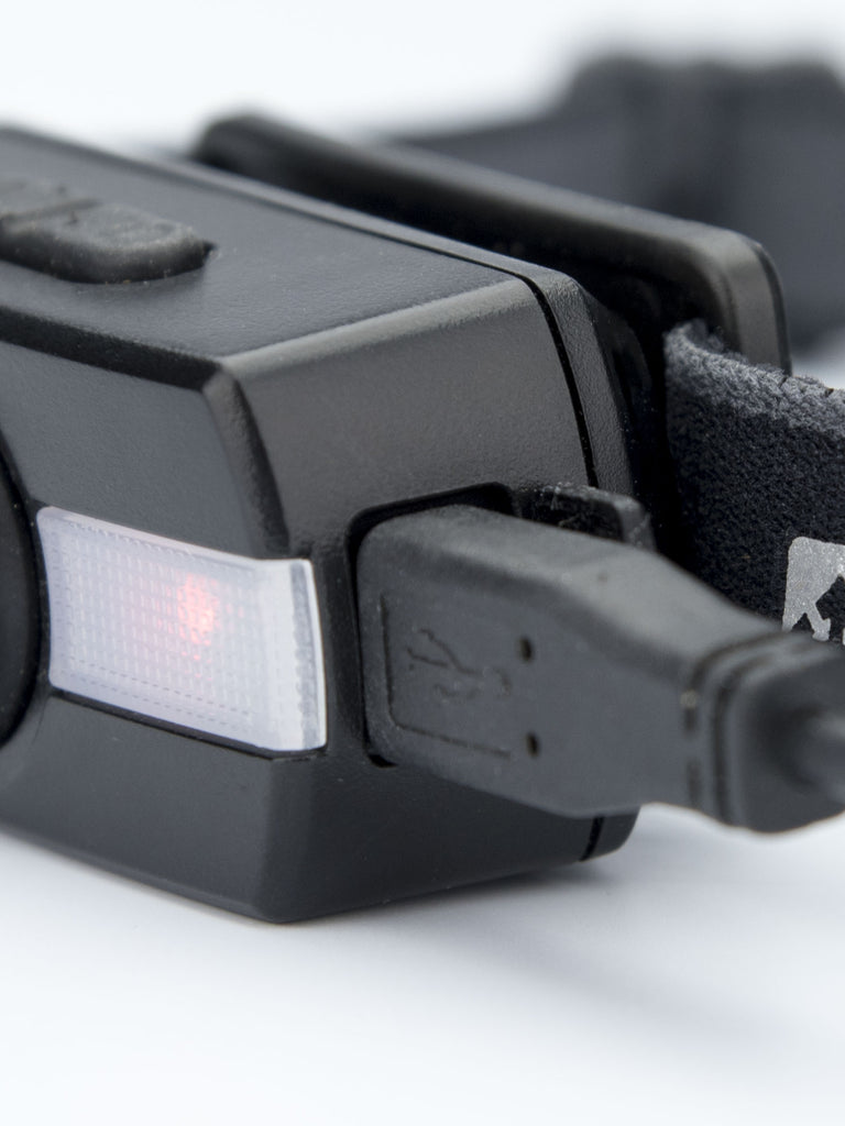 Nathan Neutron Fire RX Runner's Safety Headlamp - Black - USB Plugged In (Charging) Detail Shot