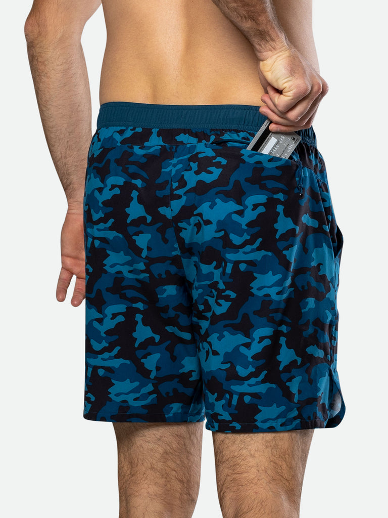 Nathan Men’s Printed Essential 7” Shorts 2.0 – Blue Camo - On Model – Pulling Credit Card from Back Pocket