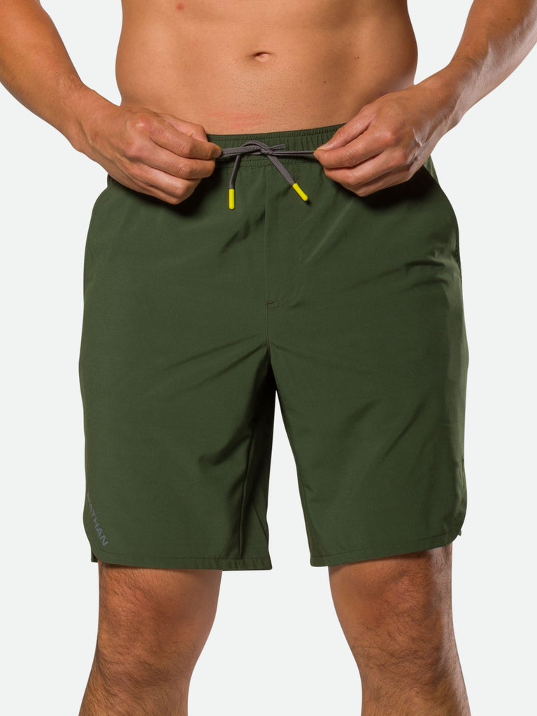 Nathan Men’s 2.0 Essential 9” Shorts – Forest Green - On Model – Tightening Drawstring for Better Fit