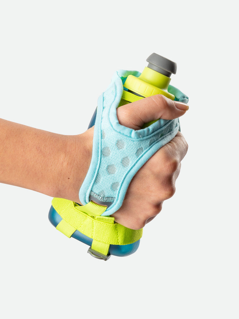 Nathan QuickSqueeze 12oz Hydration Handheld - Breezy Blue/Marine Blue - Runner Gripping Handheld Through Strap