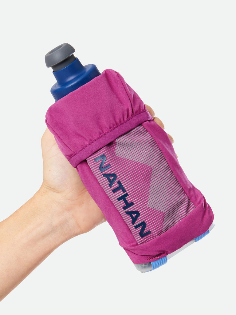Nathan QuickSqueeze 12oz Insulated Hydration Handheld - Magenta/Estate Blue - Runner Gripping Handheld - Front View